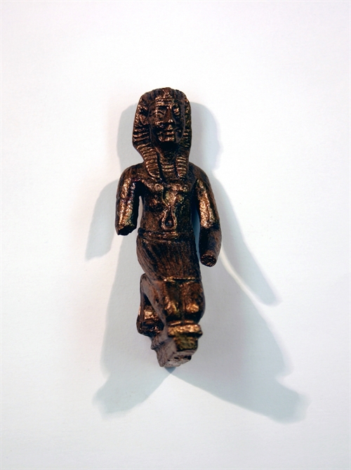 The little sculpture with the display of young pharaoh